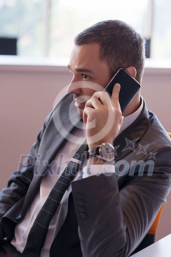 happy young business man portrait in bright modern office indoor happy young business man portrait in bright modern office indoor