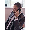 happy young business man portrait in bright modern office indoor