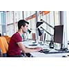 happy young business man portrait in bright modern office indoor