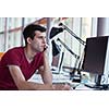 happy young business man portrait in bright modern office indoor