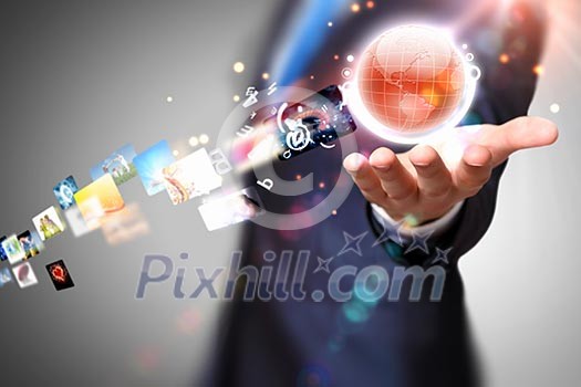 Image of globe on palm of businessman. Media technologies Image of globe on palm of businessman. Media technologies