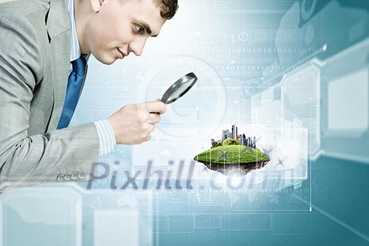 Image of businessman examining objects with magnifier