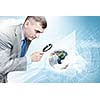 Image of businessman examining objects with magnifier. Elements of this image are furnished by NASA