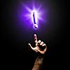 Human hand pointing with finger at exclamation sign