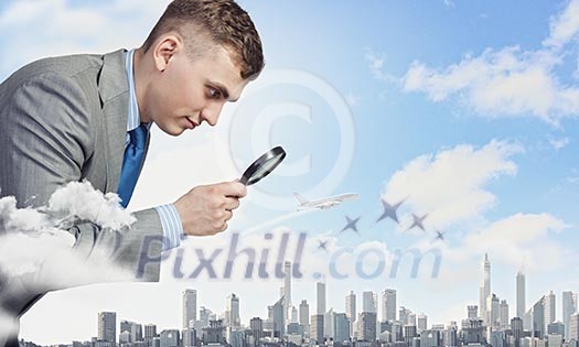 Image of businessman examining objects with magnifier Image of businessman examining objects with magnifier