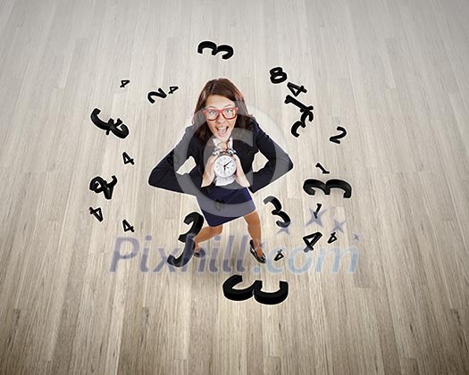 Top view of businesswoman holding alarm clock Top view of businesswoman holding alarm clock