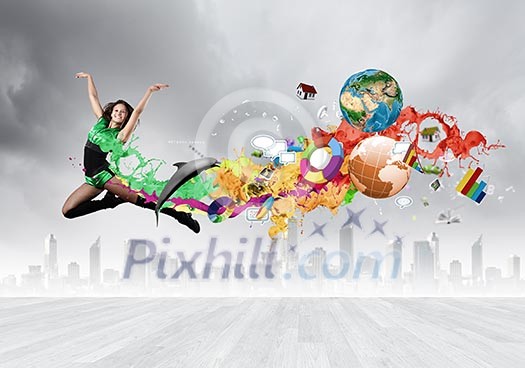 Young woman dancer in green suit jumping high Young woman dancer in green suit jumping high
