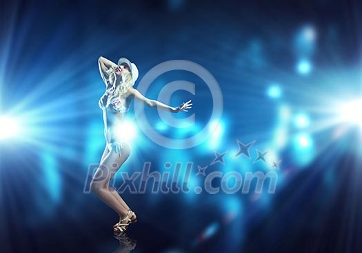 Attractive girl in swim wear dancing in party lights Attractive girl in swim wear dancing in party lights
