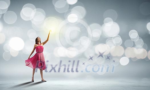 Woman in red dress against bokeh background Woman in red dress against bokeh background