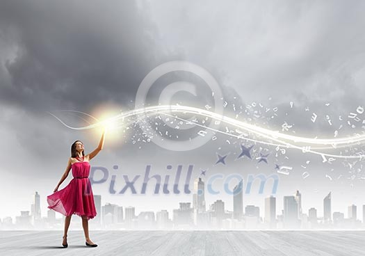 Young woman in red dress against city background Young woman in red dress against city background