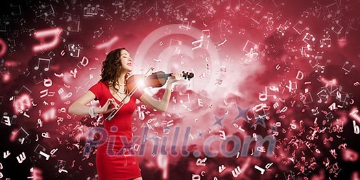 Young attractive woman in red dress playing violin Young attractive woman in red dress playing violin