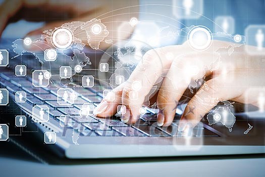 Close up image of businesswoman hands typing on keyboard