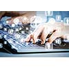 Close up image of businesswoman hands typing on keyboard