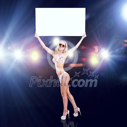 Attractive girl in swimming suit holding white blank banner above head Attractive girl in swimming suit holding white blank banner above head