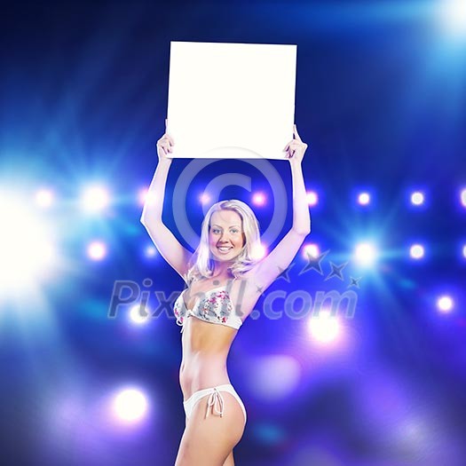 Attractive girl in swimming suit holding white blank banner above head Attractive girl in swimming suit holding white blank banner above head