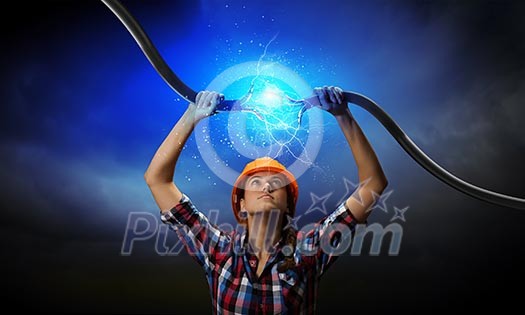 Image of woman holding electricity cable above head Image of woman holding electricity cable above head