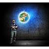 Image of man builder looking at planet Earth. Elements of this image are furnished by NASA