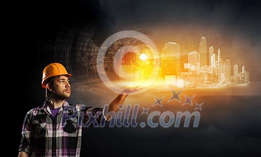 Image of man builder touching icon of media screen Image of man builder touching icon of media screen