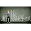 Image of man engineer against building project sketch