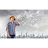Image of man engineer talking on mobile phone