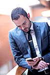 happy young business man portrait in bright modern office indoor