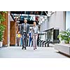 young multi ethnic business people group walking standing and top view