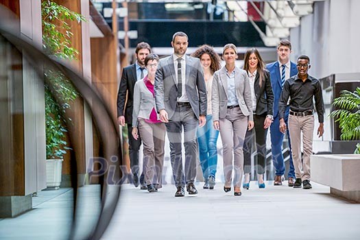 young multi ethnic business people group walking standing and top view young multi ethnic business people group walking standing and top view