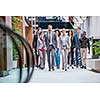 young multi ethnic business people group walking standing and top view