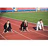 business people running together on racing track