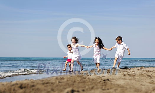 group of happy child on beach who have fun and play games group of happy child on beach who have fun and play games