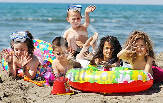 happy child group have fun on beach while playing with toys running jumping happy child group have fun on beach while playing with toys running jumping