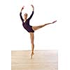 modern style ballet dancer posing and jumping on training