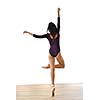 modern style ballet dancer posing and jumping on training