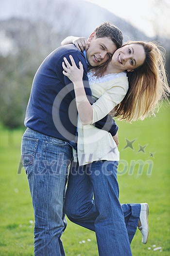 happy young couple have good time and fun outdoor at beautiful sunny day happy young couple have good time and fun outdoor at beautiful sunny day