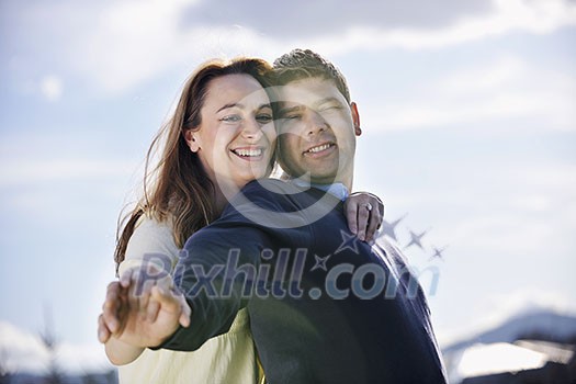 happy young couple have good time and fun outdoor at beautiful sunny day