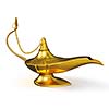 Golden Aladdin magic genie lamp isolated on white