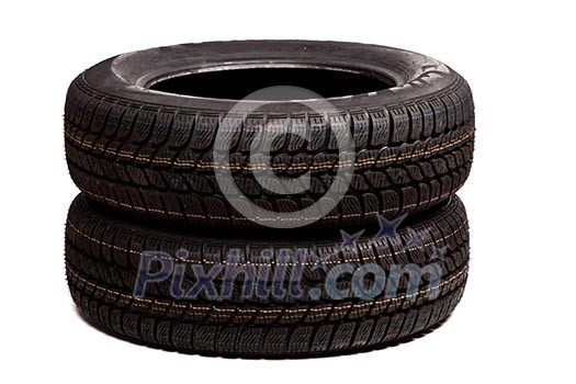 Two car tires isolated on white background Two car tires isolated on white background