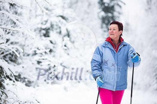 Cross-country skiing: two women cross-country skiing on a winter day (motion blurred image) Cross-country skiing: two women cross-country skiing on a winter day (motion blurred image)
