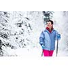 Cross-country skiing: two women cross-country skiing on a  winter day (motion blurred image)