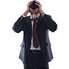 Portrait of a young business man looking depressed from work isolated over white background in studio