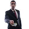 Portrait of a business man holding and catch falling money bills, isolated on white background in studio