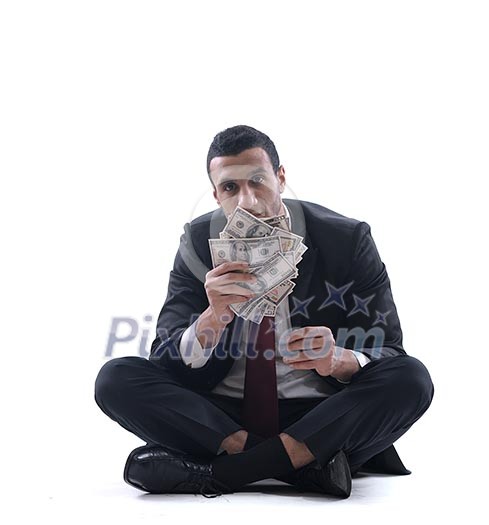 Portrait of a business man holding and catch falling money bills, isolated on white background in studio Portrait of a business man holding and catch falling money bills, isolated on white background in studio