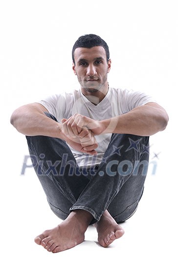 portrait of relaxed young man dressed in white shirt and jeans isolated over white background in studio portrait of relaxed young man dressed in white shirt and jeans isolated over white background in studio