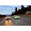 Fast tuning cars racing on the highway