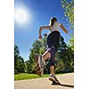 Young beautiful  woman jogging on morning at  park. Woman in sport outdoors health concept