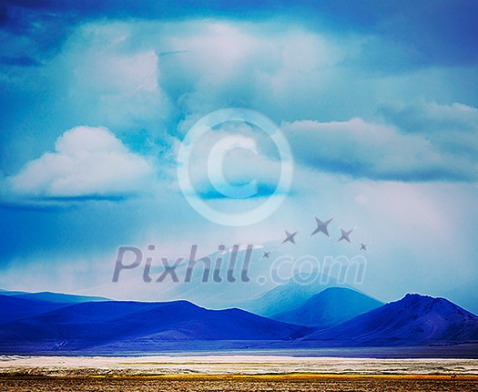 Vintage retro effect filtered hipster style travel image of Gathering storm in Himalayas mountains. Ladakh, India Vintage retro effect filtered hipster style travel image of Gathering storm in Himalayas mountains. Ladakh, India
