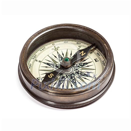 Old vintage retro golden compass isolated. Top view Old vintage retro golden compass isolated. Top view