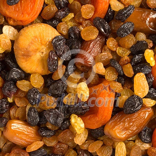 Various dried fruits (apricots, dates, raisins, figs) close-up Various dried fruits (apricots, dates, raisins, figs) close-up