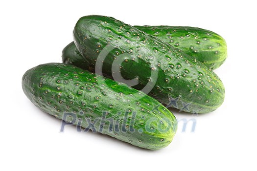 Three green cucumbers isolated on white background Three green cucumbers isolated on white background