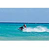 Man riding jet ski in Caribbean sea
